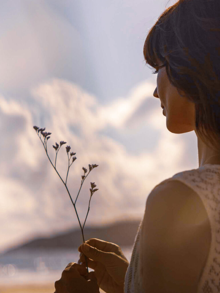 Vitale_Group_Eade_Byron_Bay_Unseen_Woman_holding_Flower_1920x2556